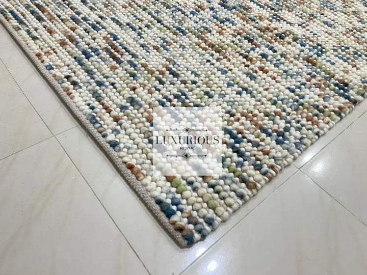 Pebbles Cherry Hand Woven Multi Color Wool and Cotton Blend Rug